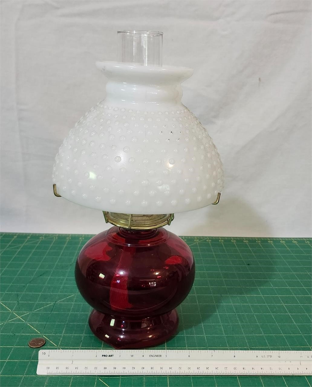 Ruby red kerosene lamp w/ hobnail milk glass shade