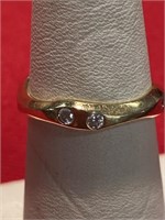 14 karat gold ring. Size 7. Interesting design.