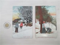 2 cartes postales antiques "A tram in the snow"