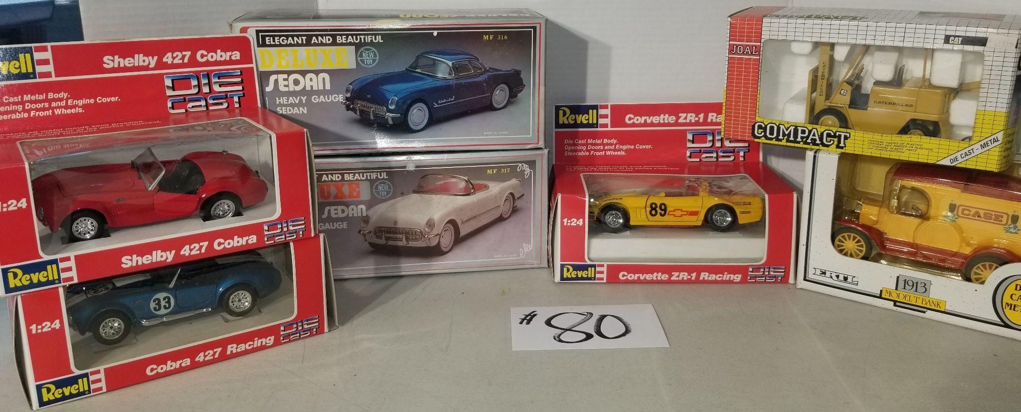 7 Die Cast Cars 1:24 scale,