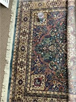 Tapis oriental bordure à frange