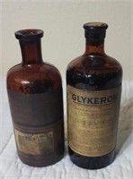 Pair of old medicine bottles