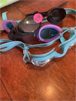 Three pair of swimming goggles