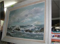 Ocean scene with crashing waves and seagulls