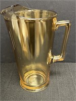 Carnival glass pitcher, approx 9 1/2in