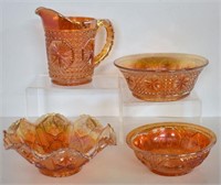 FOUR PIECES OF MARIGOLD CARNIVAL GLASS