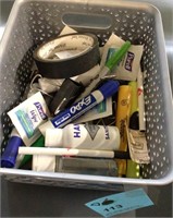 Miscellaneous office supplies in basket