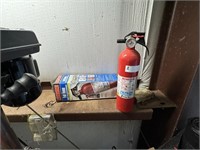 TWO FIRE EXTINGUISHERS