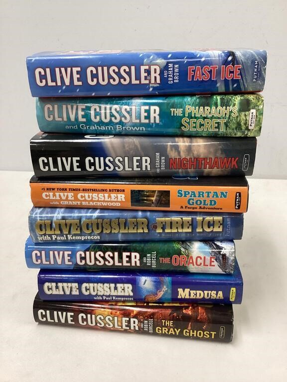 Eight Clive Cussler Books Lot C