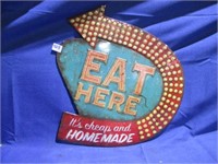 eat here sign .
