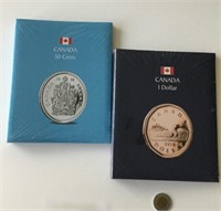 2 Albums pour pièces de monnaies
canadiennes 50¢