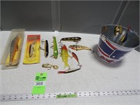 Large fishing lures in a small galvanized buckets
