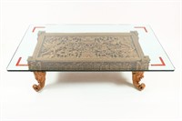 CARVED INDONESIAN GLASS TOP COFFEE TABLE