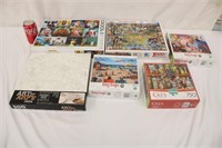 Six 1000 - 500 Piece Puzzles