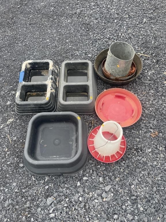 Chicken waters and feed pans