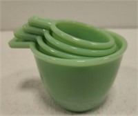4 green Jadeite measuring cups