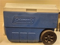 Coleman cooler on wheels.