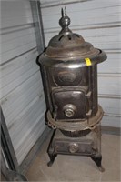 ANTIQUE POTBELLY STOVE COMFORT STOVE  APPX . 4FT