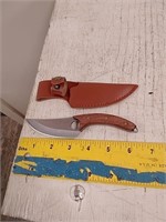 Spinning knife with sheath