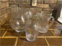 3 clear glass pitchers 9", 7 1/2", and 6 3/4"