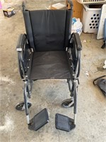 Breezy wheel chair with feet platforms
