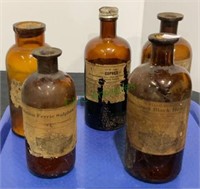 Tray lot of antique pharmacy bottles with