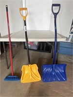 2 snow shovels and broom
