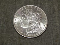 1883 O Morgan Silver Dollar UNC to me U Grade..