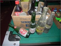 Box of Old Soda Bottles and Cans