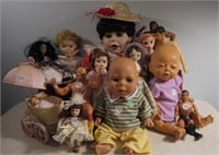 13 Dolls and 2 Carriages- (1) 23 1/2" Bisque