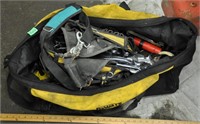 Large wrenches, tools in bags