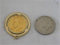 Gold coated 1972 Ike dollar in pendant frame -