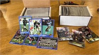 R. 2 small boxes of football cards