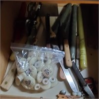 DRAWER OF UTENSILS AND KNOBS