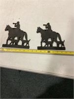 Plastic horse and dog silhouettes