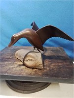 Carved wooden bird just landing 5 inches