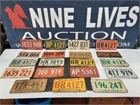 assortment of old license plates