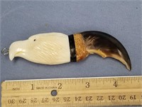 4 1/2" bear claw with fossilized ivory eagle head,
