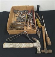 Box of miscellaneous shop tools and a flashlight