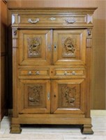 French Hunt Motif Carved Oak Cabinet.