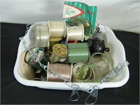 Tub full of fly fishing string Plus weight