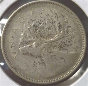 Silver 1965 Canadian quarter