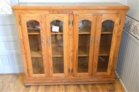 Oak Bookcase w/Glass Doors Casters on the Bottom;