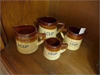 4pc brown ware vintage measuring pitchers