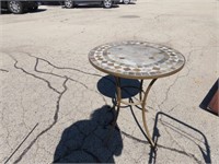 Heavy tile top table. w/2 chairs.