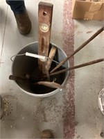 Bucket of misc. tools.  Level , hand sickles