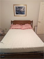 Full Size Bed and Framed Artwork