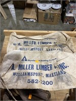 Antique metal piece and 2 G A Miller lumber waist