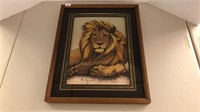 Reverse painting lion in frame