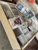 Box of baseball cards, in plastic cases